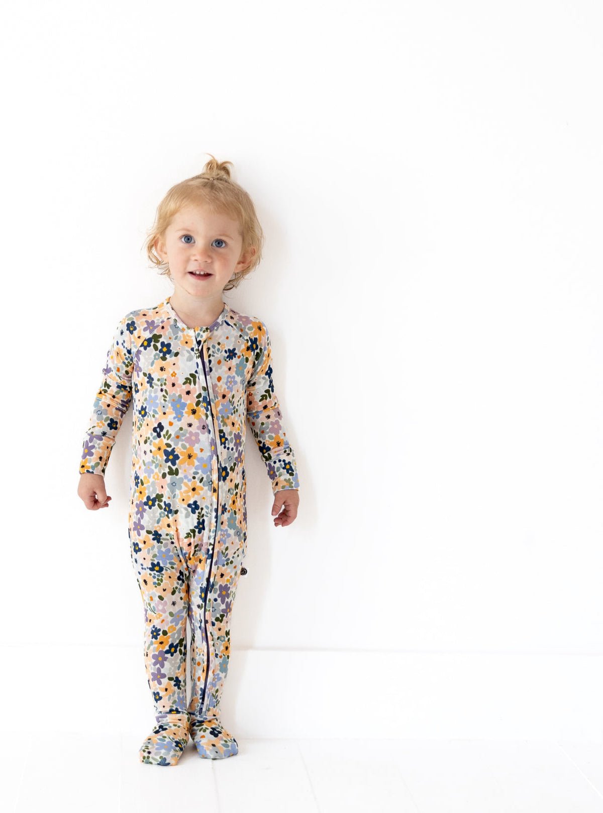 FLOWER CHILD | ZIP ROMPER